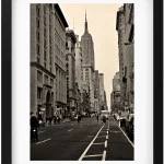 New York street in black and white with the Empire State Building 1920