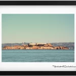 Unveiling the Rock_ A Glimpse of Alcatraz Island from the Bay 1920